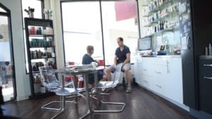 work with a hair colorist here at Salon Povera